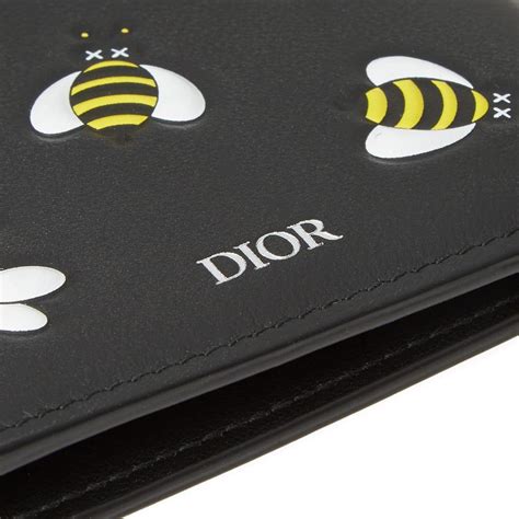 kaws dior wallet|Dior x Kaws Wallet Yellow Bees Black .